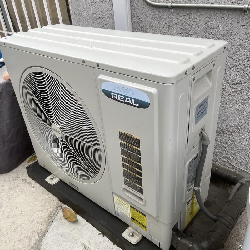 Lennox outdoor air conditioning unit with fan