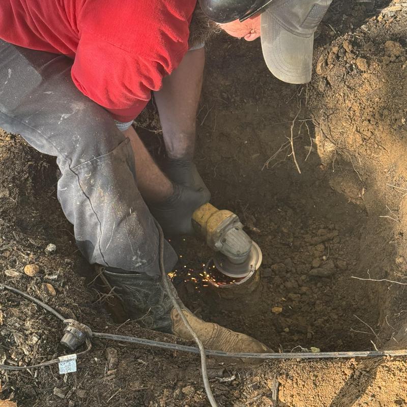 Sewer main pipe grinding in ground excavation
