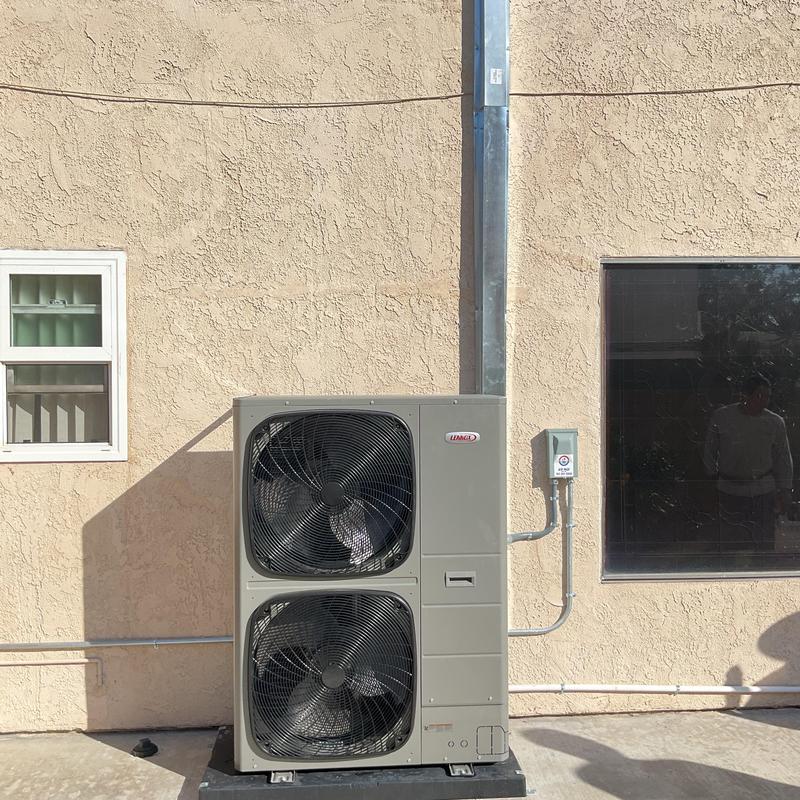 Lennox EL18KSLV condenser unit installed outside