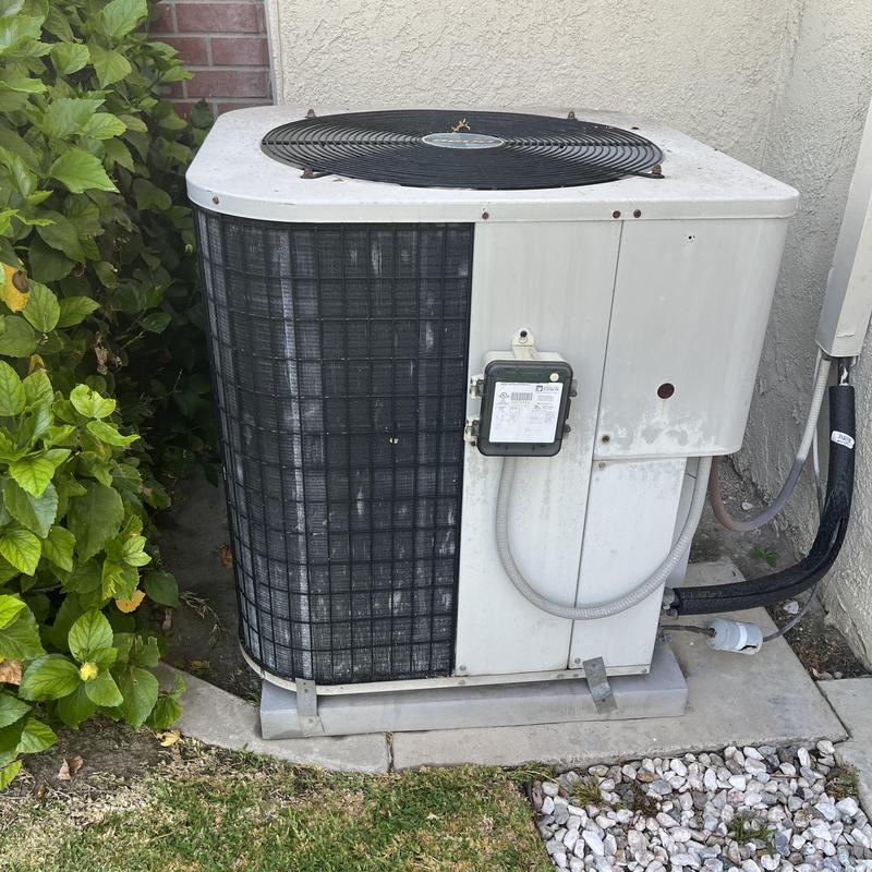 ML14KC1 condenser unit installed outdoors