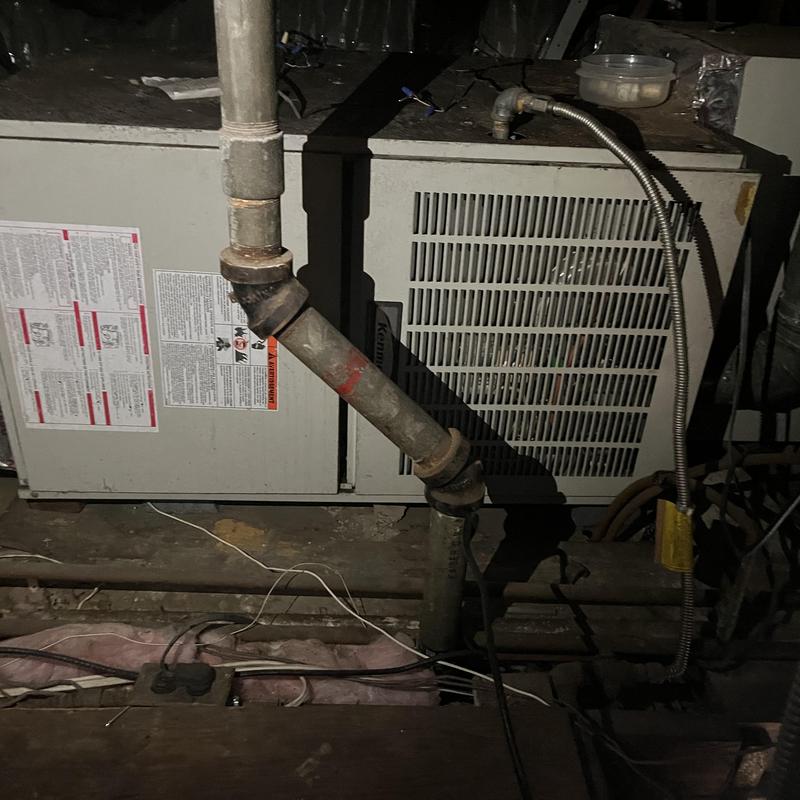 Furnace EL180UH with connected vent pipe in attic