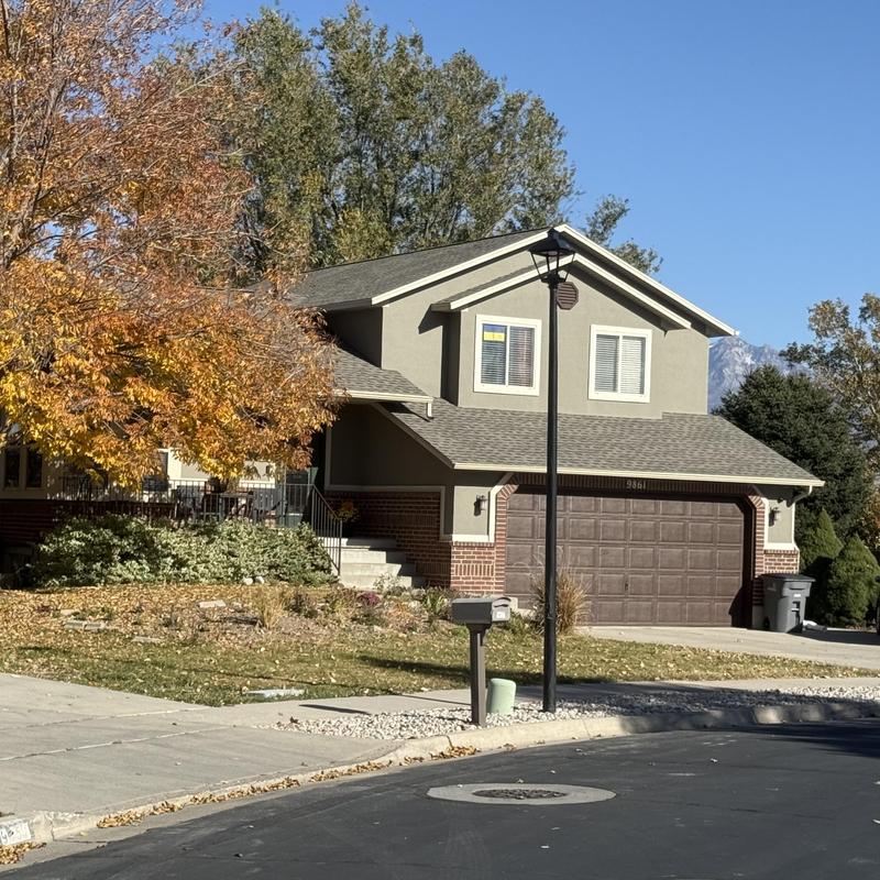 Gutter installation on residential home exterior Gutter installation on residential home exterior