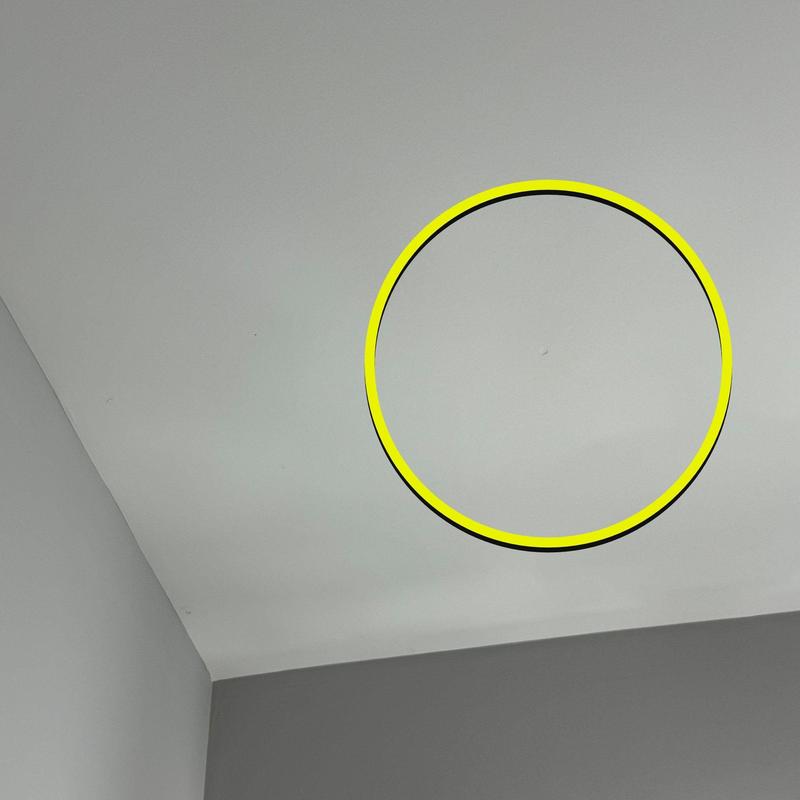 Ceiling drywall with minor surface imperfections circled