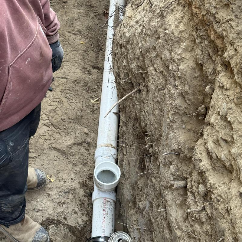 4-inch sewer pipe excavation with cleanout installation