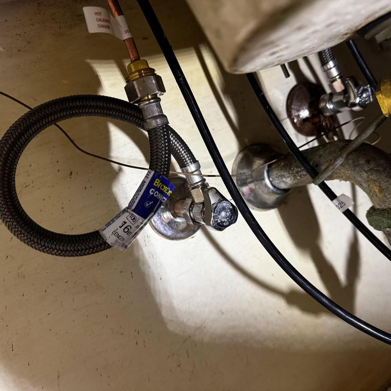 Angle stop shutoff valves and braided faucet lines under sink