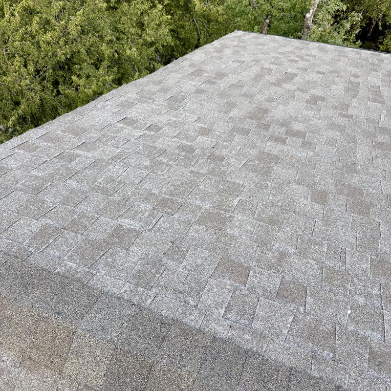 Owens Corning asphalt shingle roof with hail damage