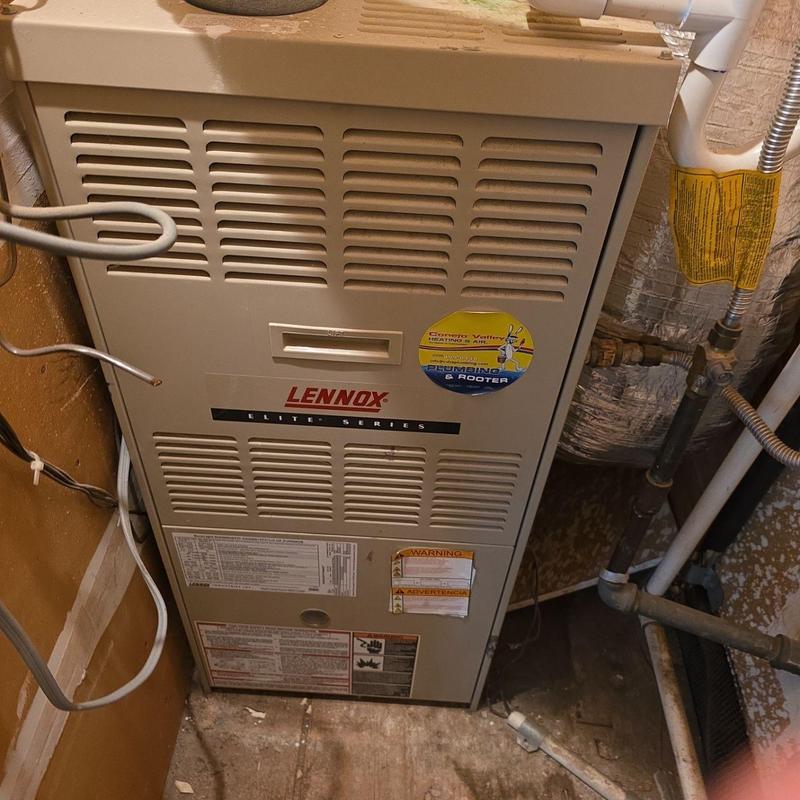 Lennox Elite Series Furnace installed in utility room