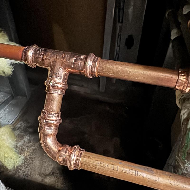 12 copper hot water line with new fittings installed
