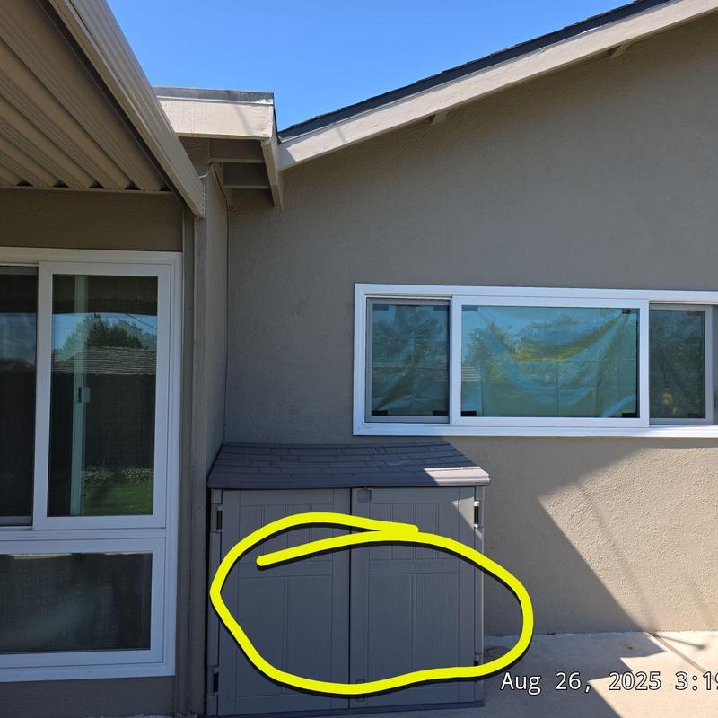 Furnace and condenser outdoor unit enclosure in backyard