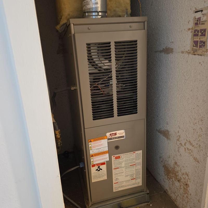 ML180UH Furnace installed in utility closet