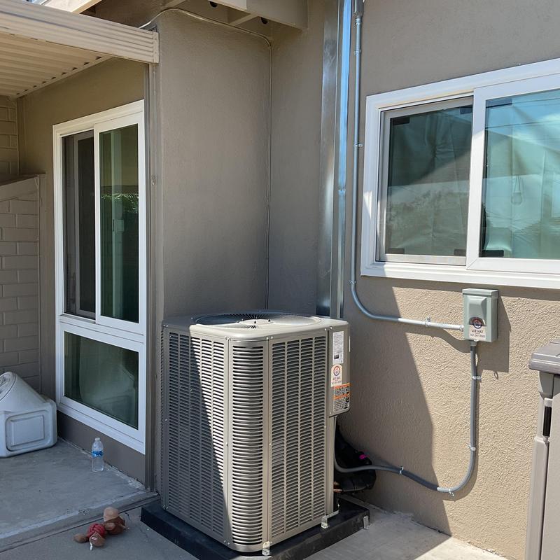 ML14KC1 air conditioner condenser installed outdoors