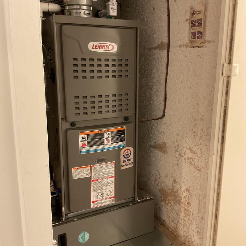 Lennox ML180UH furnace installed in utility closet
