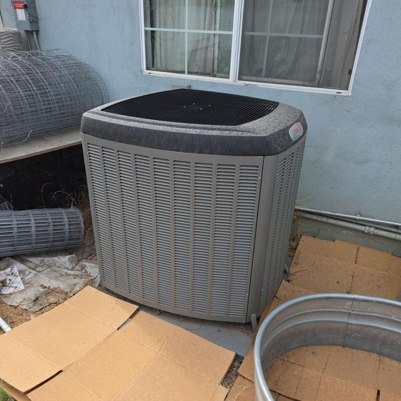Air conditioner unit installed outside residential home