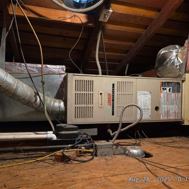 Lennox SL280UH furnace in attic with ductwork