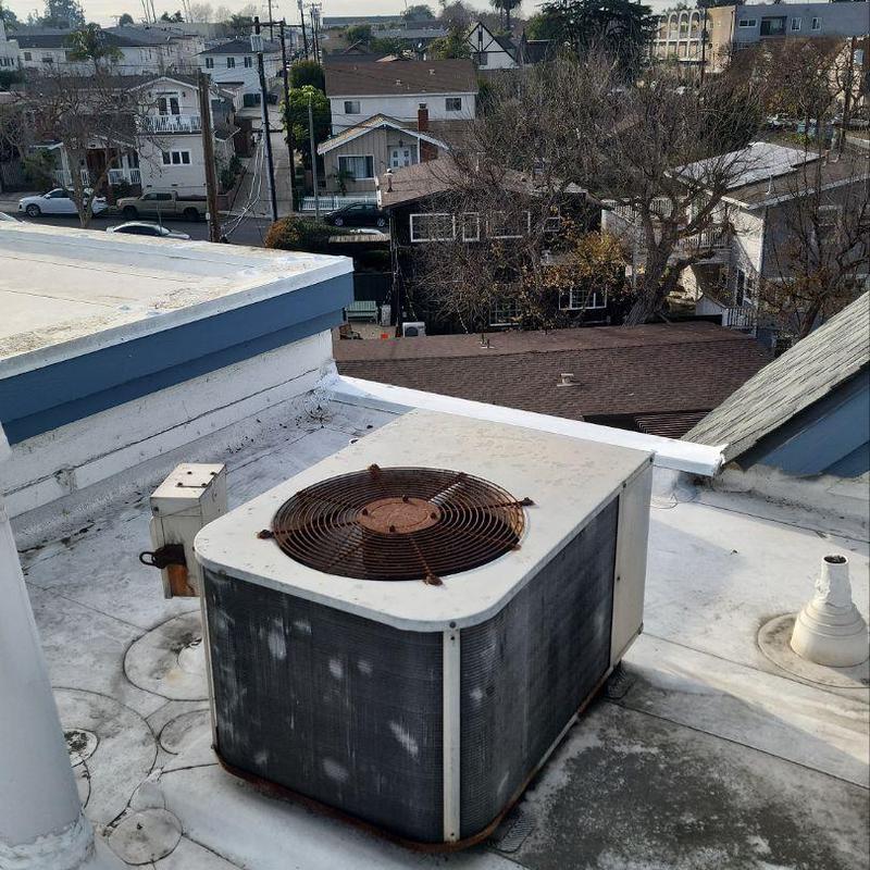 ML14KC1 condenser unit on flat rooftop in Burbank