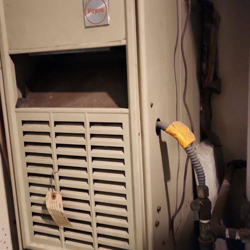 Furnace unit with vent panels and gas line connection