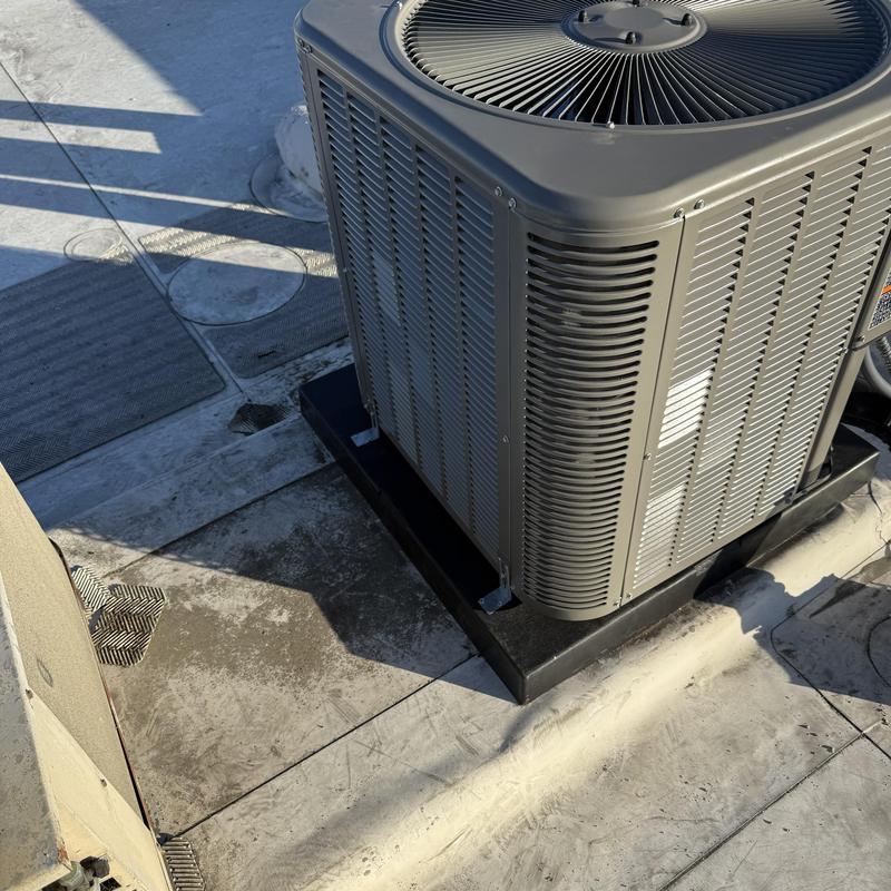 ML14KC1 condenser unit on rooftop installation