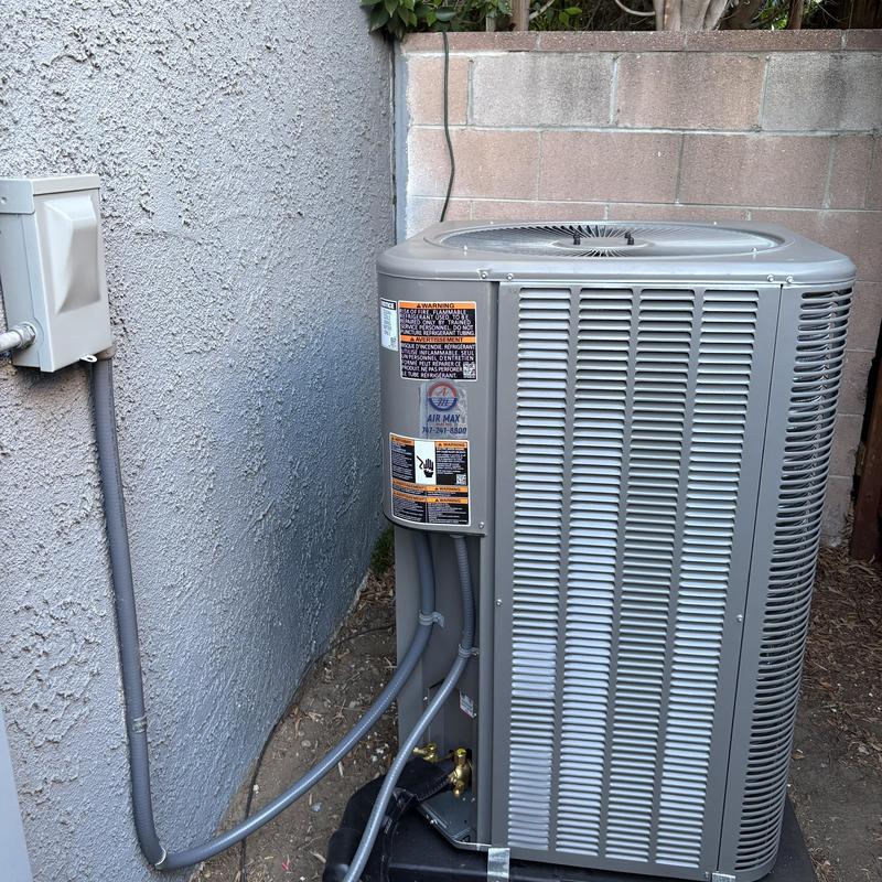 ML14KC1 condenser unit installed outside wall
