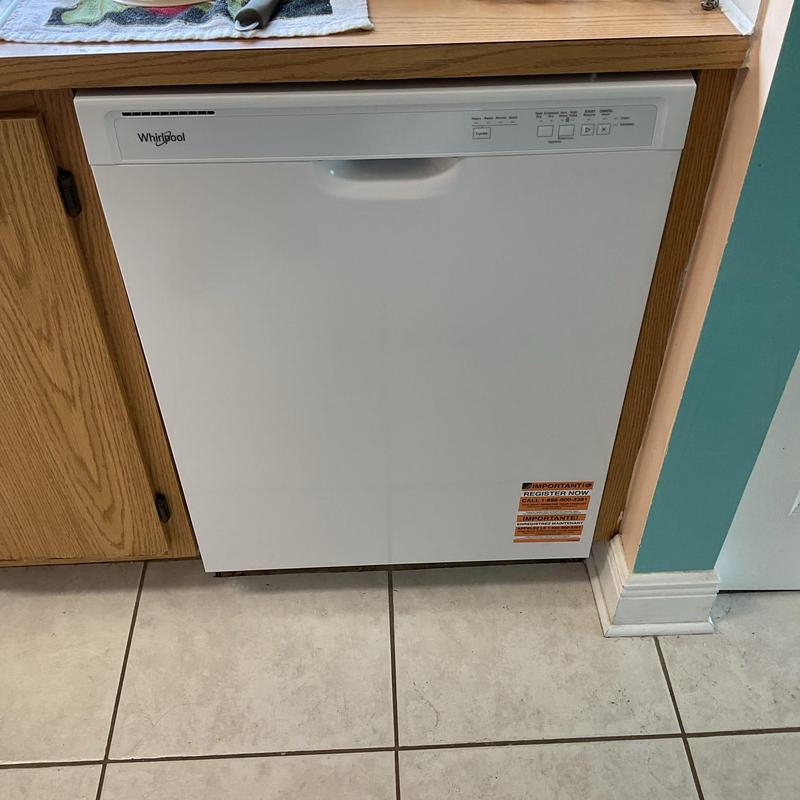 Whirlpool dishwasher installed in kitchen cabinet space