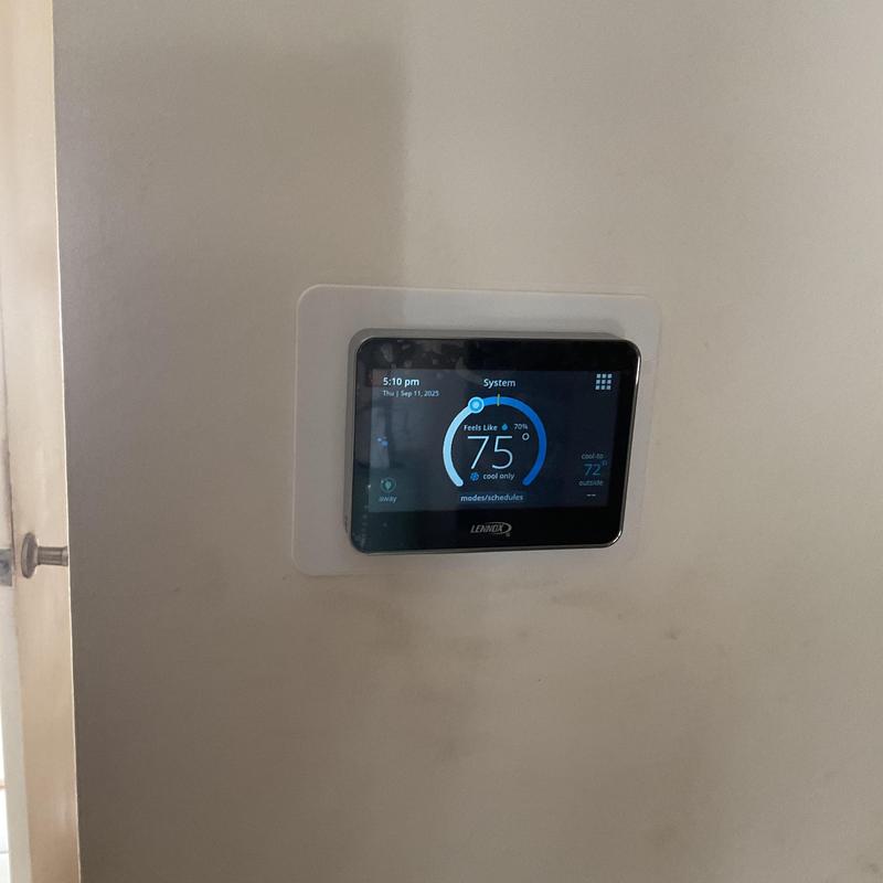 Lennox smart thermostat installed on wall