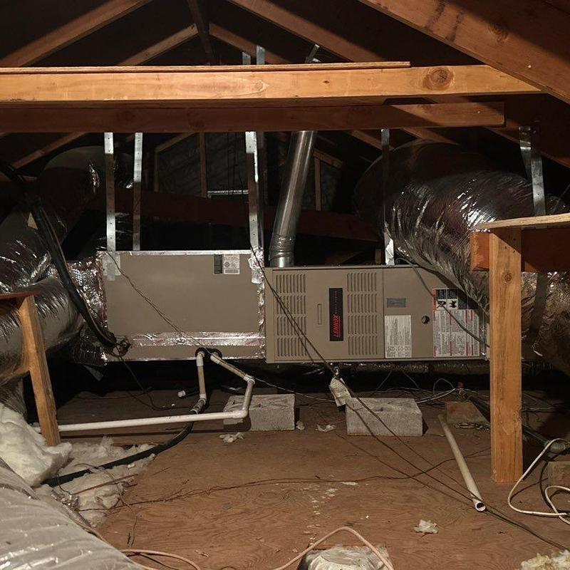 Furnace EL180UH installed in attic with ductwork