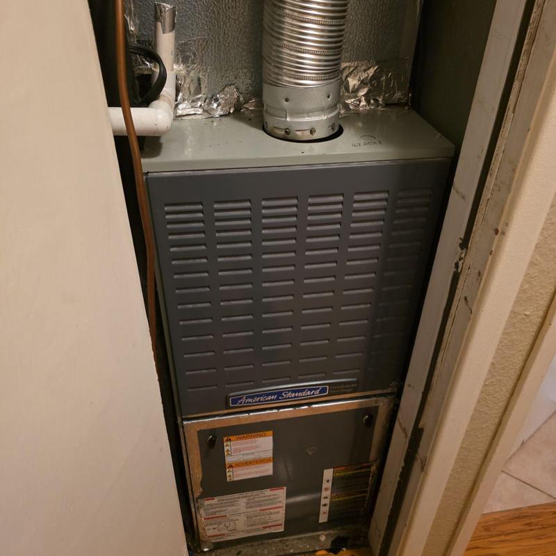 EL180UH American Standard furnace in narrow closet