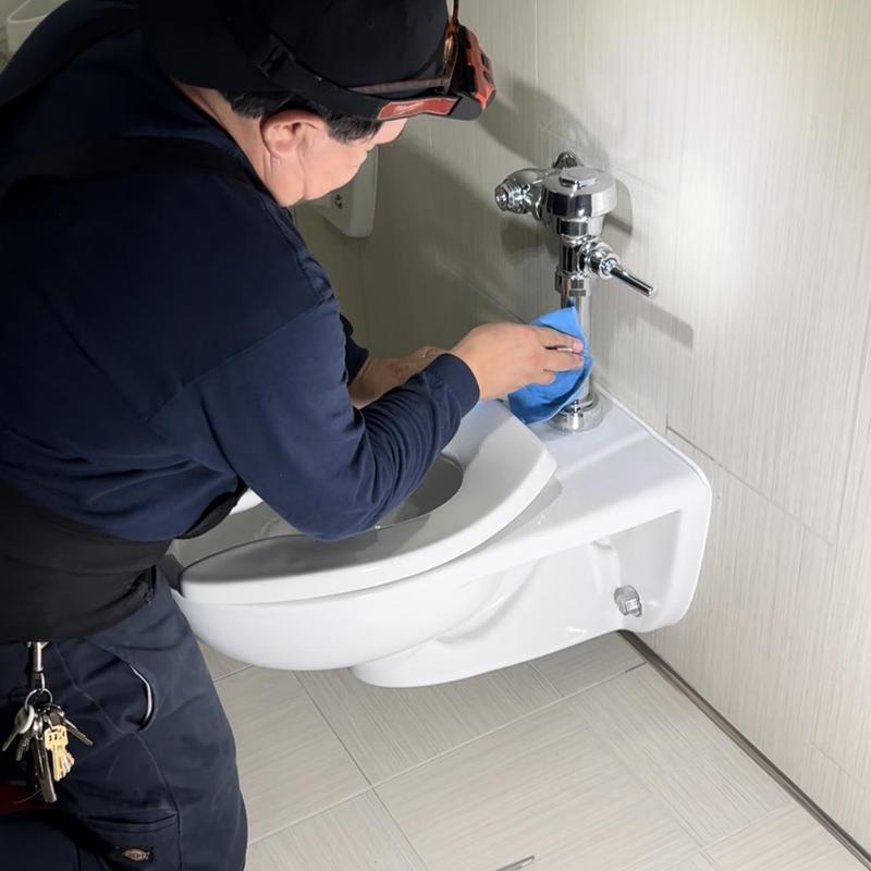 Wall-hung toilet installation and plumbing cleaning