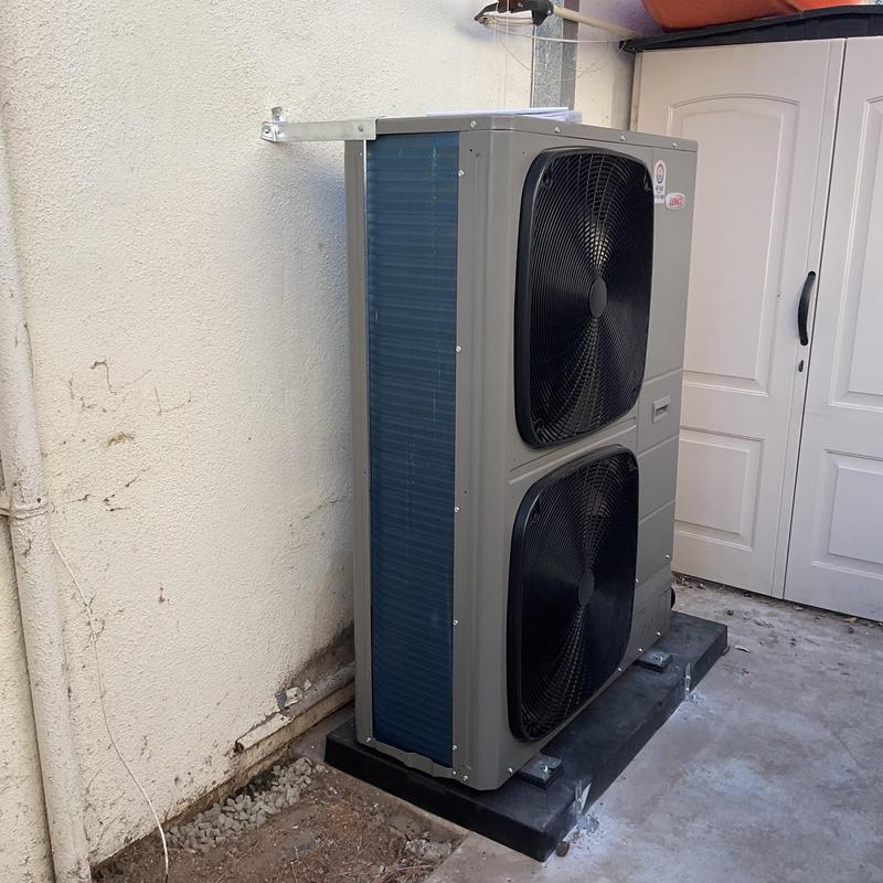 EL18KSLV condenser unit installed on pad