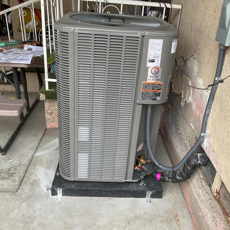 ML14KC1 condenser installation on concrete pad