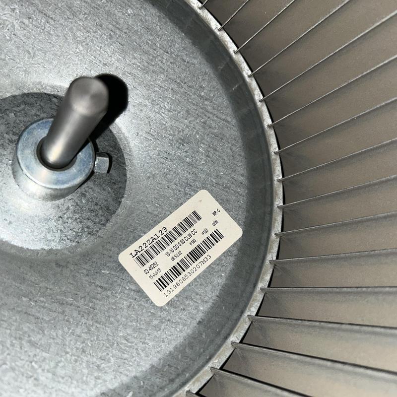 HVAC blower wheel close-up with barcode label