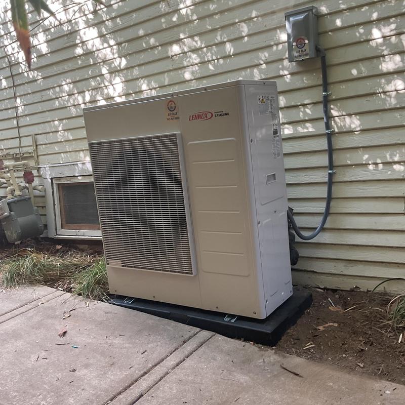 Minisplit outdoor condenser unit installed with electrical hookup Minisplit outdoor condenser unit installed with electrical hookup