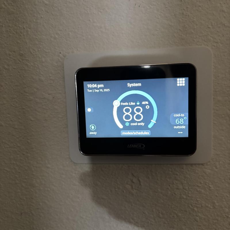 Lennox thermostat displaying current cooling settings