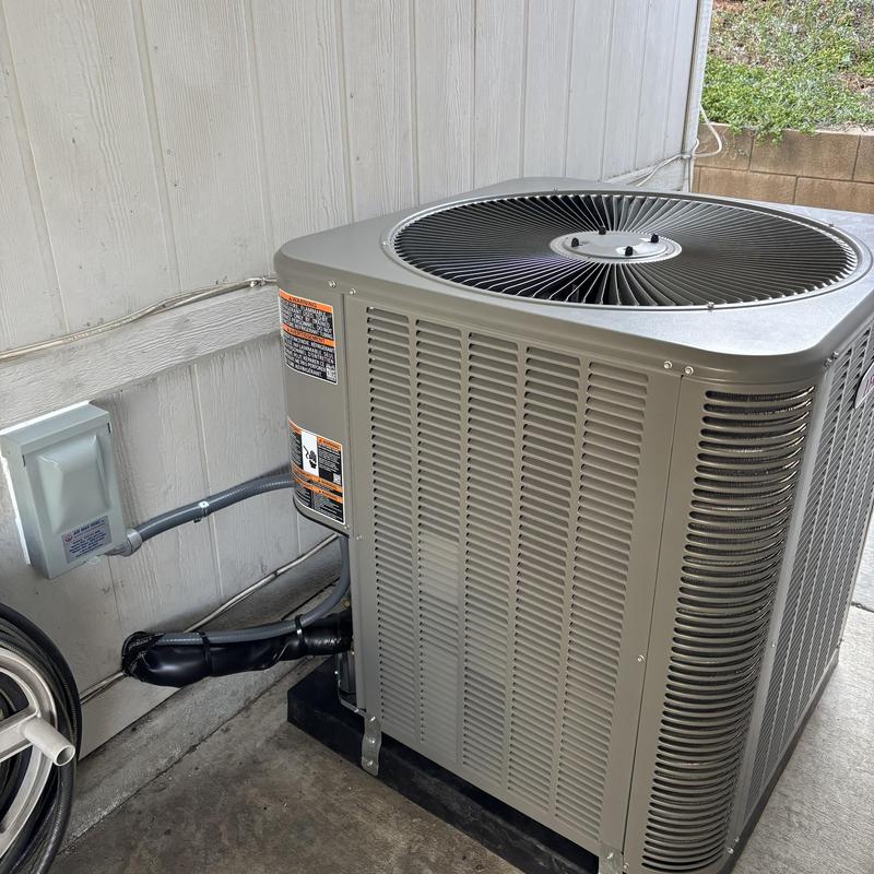 ML14KC1 condenser unit installed on patio