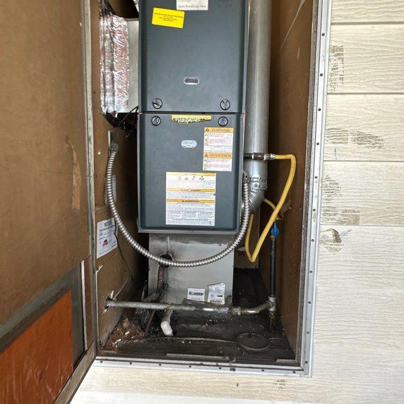 SL280UH furnace installation in wall cavity