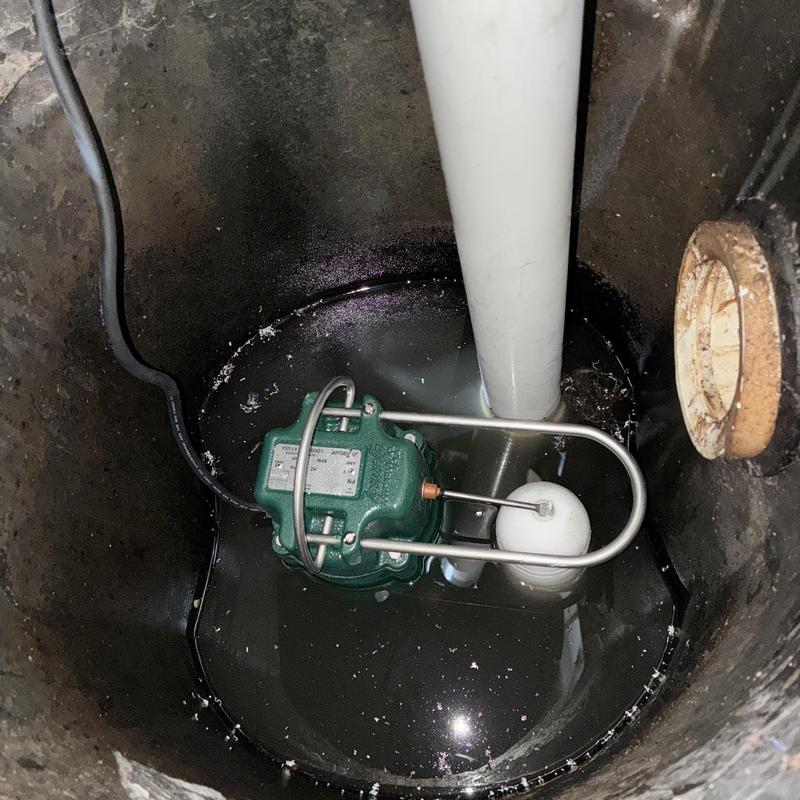 Sewage pump system with float switch in sump basin