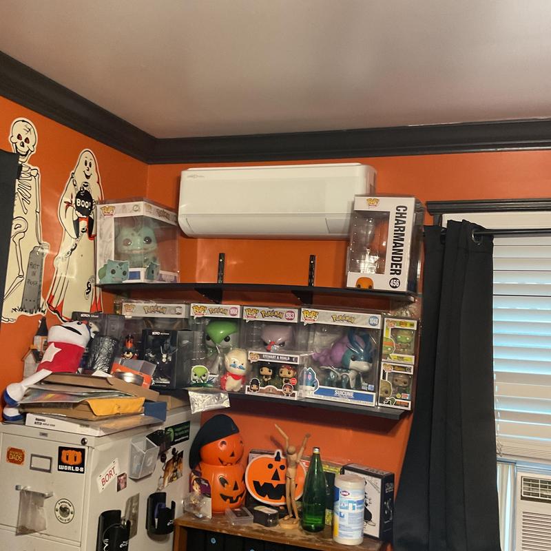 Mini split headunit installed on orange wall Mini split headunit installed on orange wall