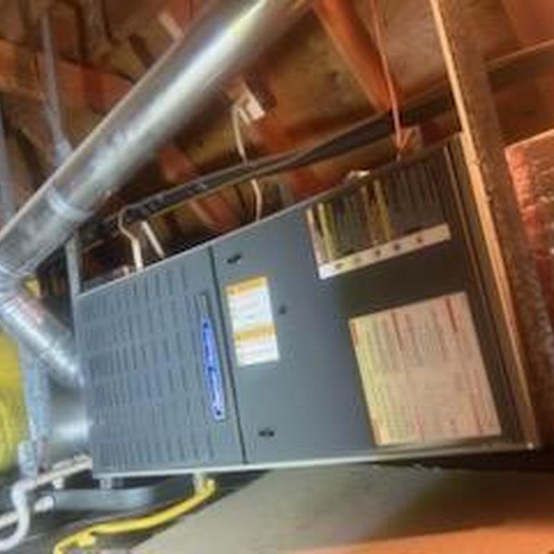 ML180UH furnace installation in attic with ductwork