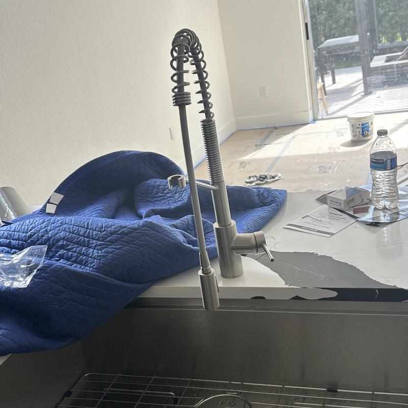 Kitchen faucet installation with pull-down sprayer