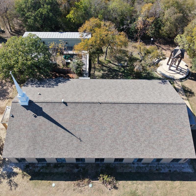 Church roof shingles replaced on large pitched roof