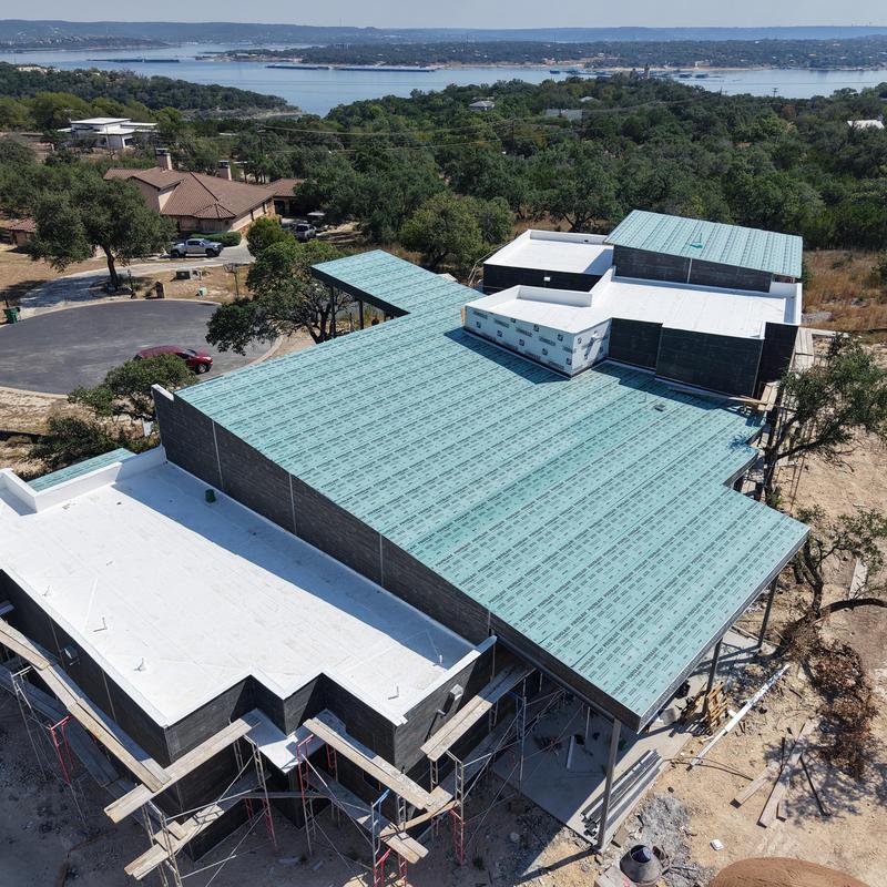 TPO flat roofing installation on residential property