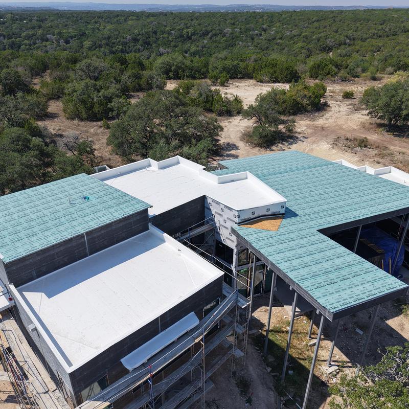 TPO flat roofing installation on residential property