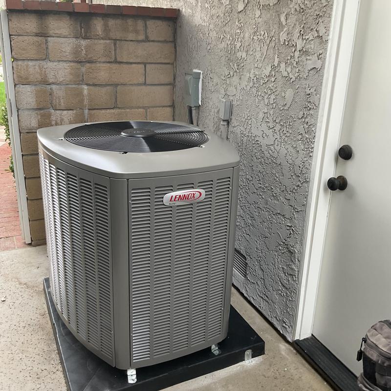 Lennox EL18KCV condenser installed on slab outside
