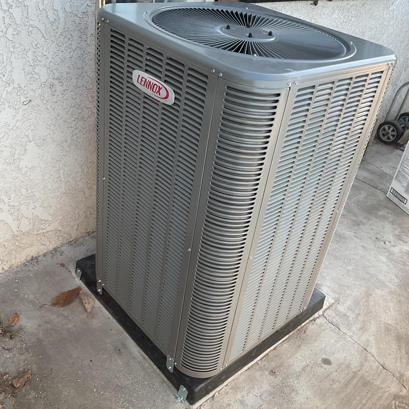 Lennox ML14KC1 condenser unit installed on pad