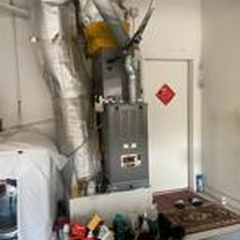 Furnace and ductwork installed in utility room