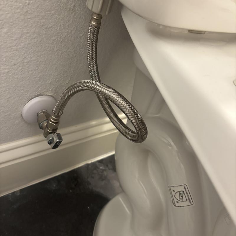 Toilet supply line with braided stainless steel hose