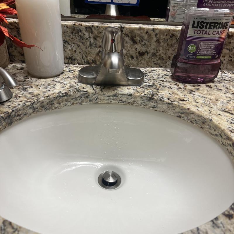 Delta single-handle satin finish faucet on bathroom sink