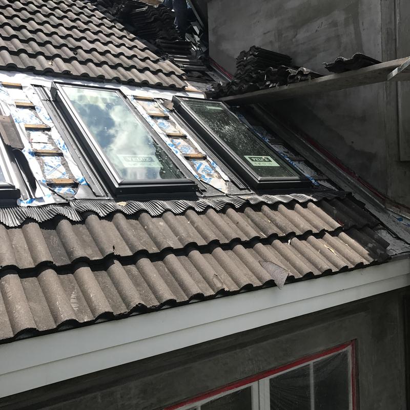 Velux skylight installation on Boral tile roof