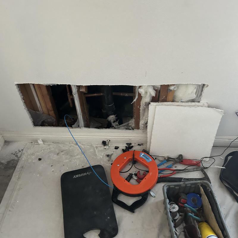 Copper slab leak detection with drywall opening