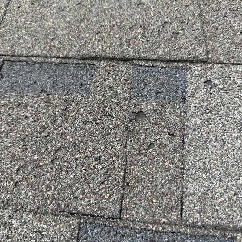 Shingle roof with severe wear and granule loss