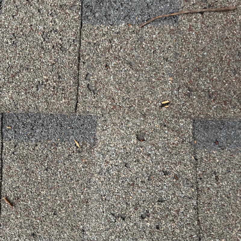 Shingle roof with severe aging and granule loss